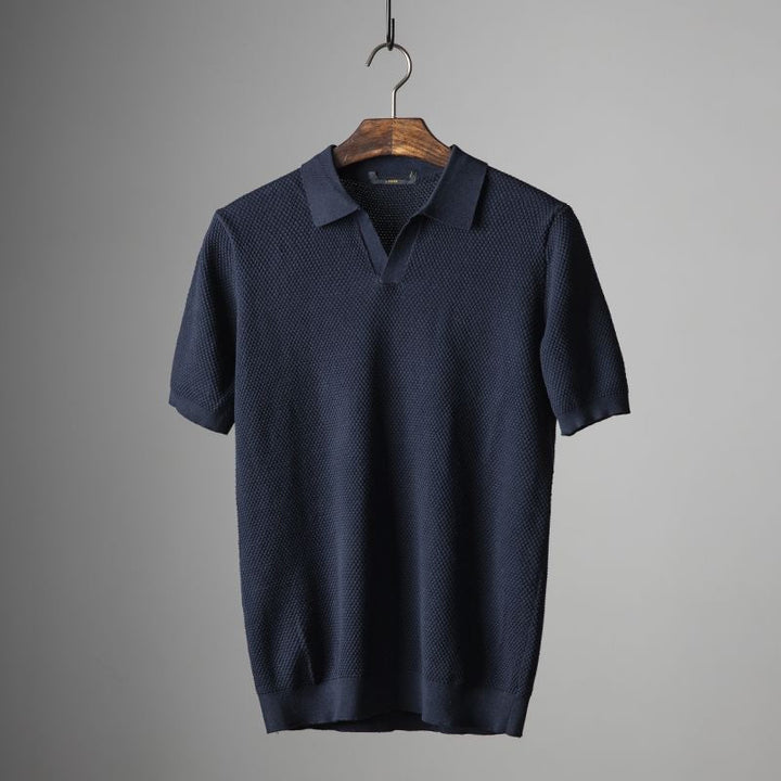 Luxe knitted polo shirt for men with lightweight, breathable fabric, offering style and comfort for summer days.