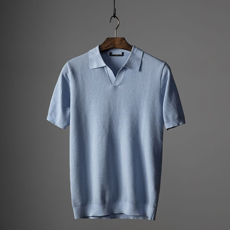 Luxe knitted polo shirt for men with lightweight, breathable fabric, offering style and comfort for summer days.