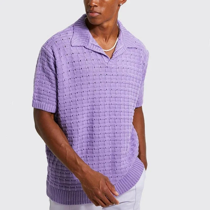 Trendy men's knitted polo shirt with breathable fabric and modern fit, perfect for casual and smart looks during summer days.