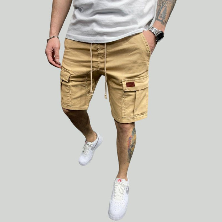 Breezy cotton cargo shorts for men with breathable fabric and multiple pockets, ideal for staying cool on summer days.