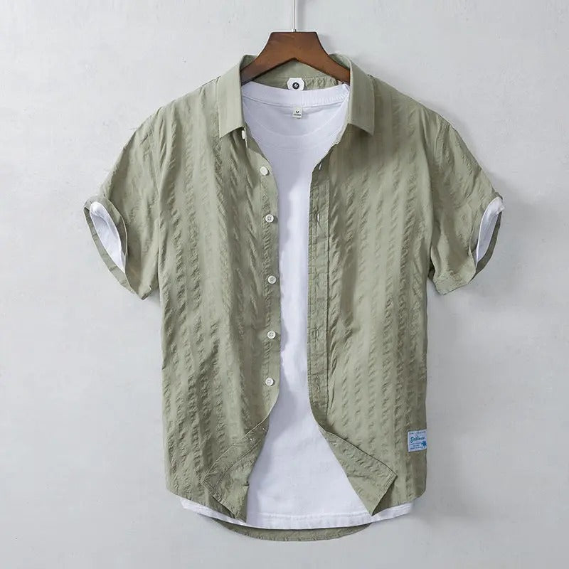 Men’s breezy cotton shirt with breathable and lightweight fabric, perfect for casual summer days and warm-weather comfort.