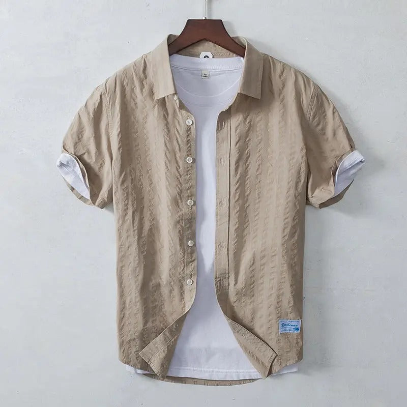 Men’s breezy cotton shirt with breathable and lightweight fabric, perfect for casual summer days and warm-weather comfort.