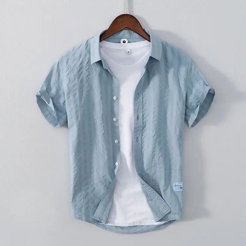 Men’s breezy cotton shirt with breathable and lightweight fabric, perfect for casual summer days and warm-weather comfort.