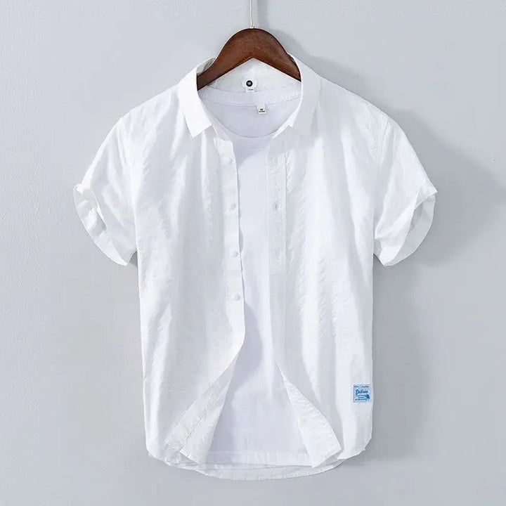 Men’s breezy cotton shirt with breathable and lightweight fabric, perfect for casual summer days and warm-weather comfort.