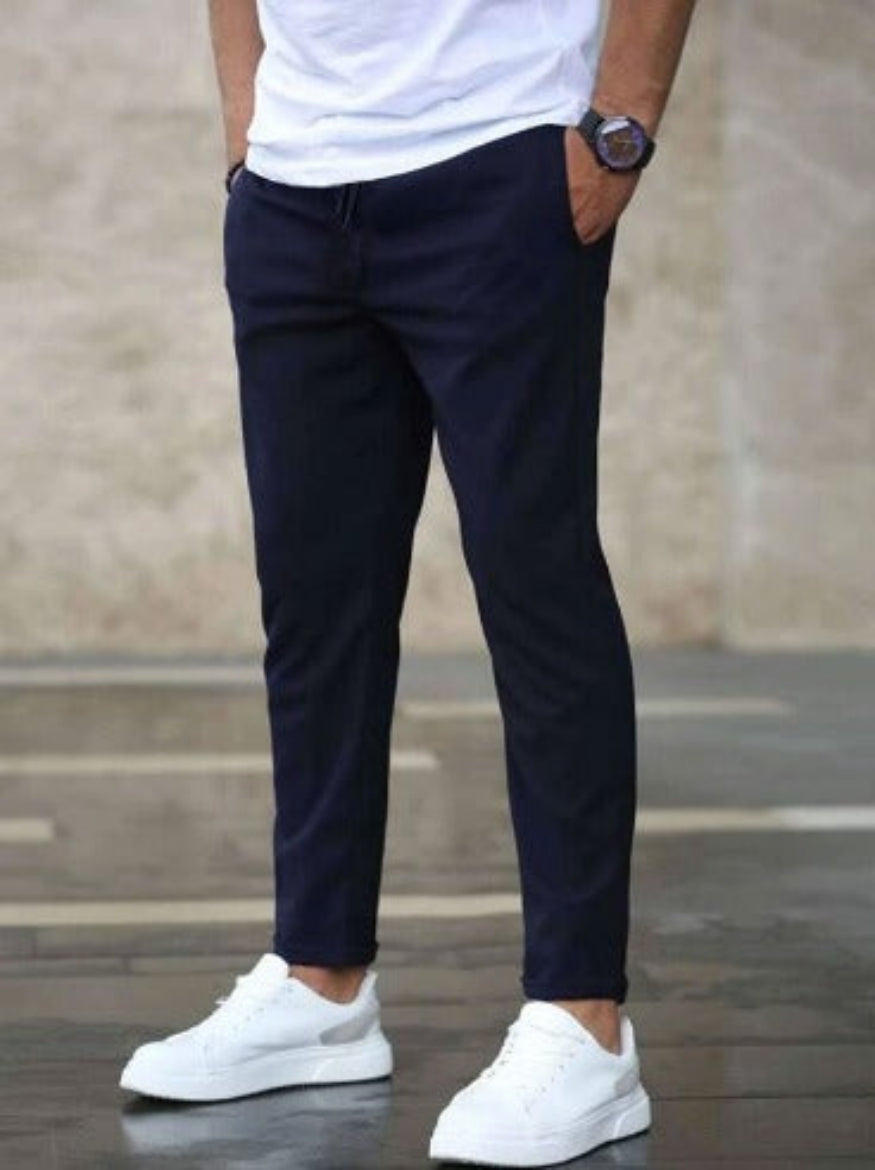 Men’s casual comfy pants with soft, breathable fabric and a relaxed fit, ideal for summer days and versatile everyday wear.