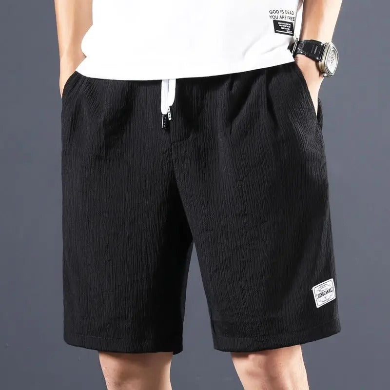 Casual cotton linen summer shorts with breathable, lightweight fabric, relaxed fit, and moisture-wicking properties, ideal for warm summer days.