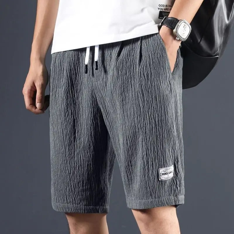 Casual cotton linen summer shorts with breathable, lightweight fabric, relaxed fit, and moisture-wicking properties, ideal for warm summer days.