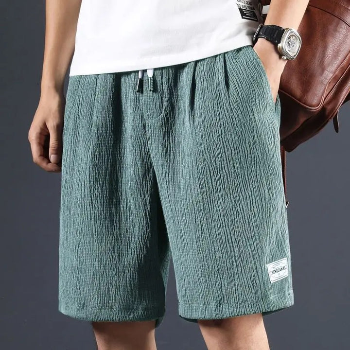 Casual cotton linen summer shorts with breathable, lightweight fabric, relaxed fit, and moisture-wicking properties, ideal for warm summer days.