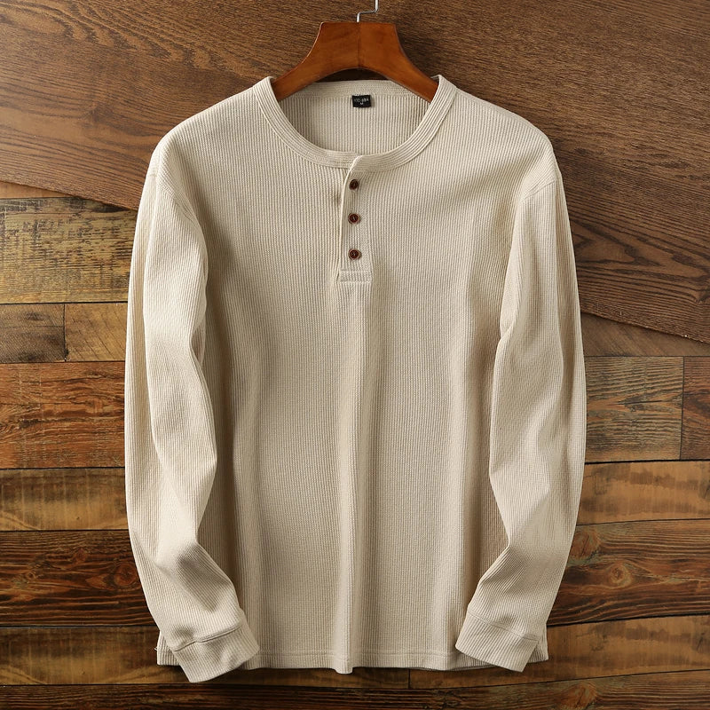 Casual long-sleeve Henley shirt offering a breathable and comfortable design, perfect for summer days.