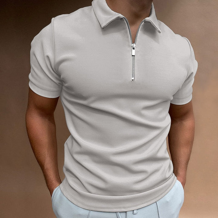 Casual men’s polo shirt with breathable fabric and classic design, perfect for summer comfort and style.