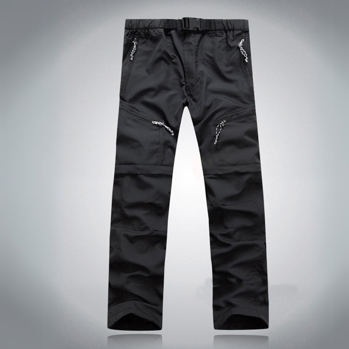 Casual multipocket outdoor pants with a relaxed fit, breathable fabric, and durable material, perfect for summer adventures and outdoor activities.






