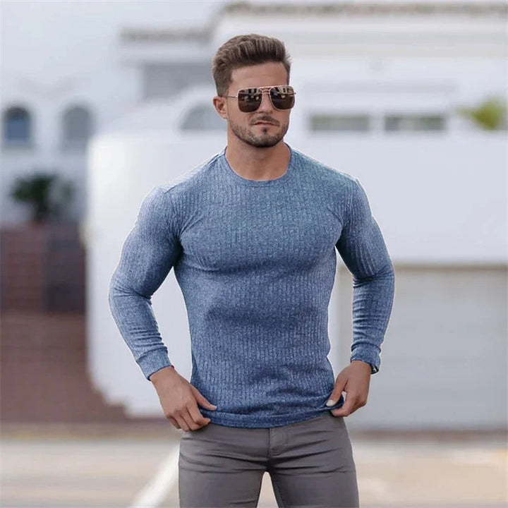 Men’s casual muscle fit shirt with a tailored design, breathable fabric, and versatile style for warm days and social occasions.