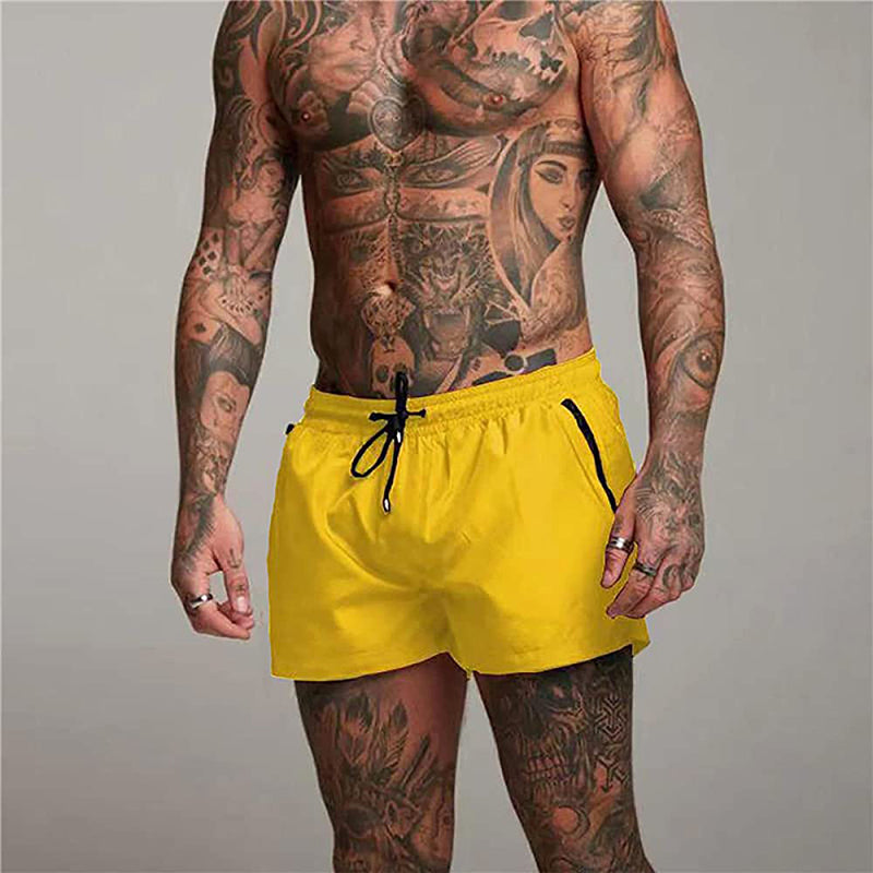 Classic beach shorts for men with breathable, quick-drying fabric and adjustable waistband, perfect for summer beach outings and casual wear.






