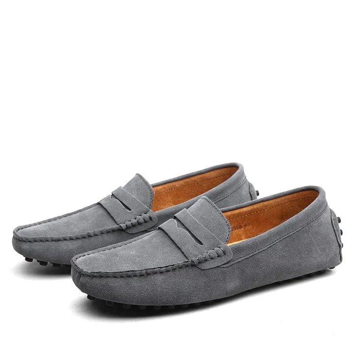 Classic elegant suede loafers with a timeless design, soft suede finish, and cushioned insoles, ideal for summer days.






