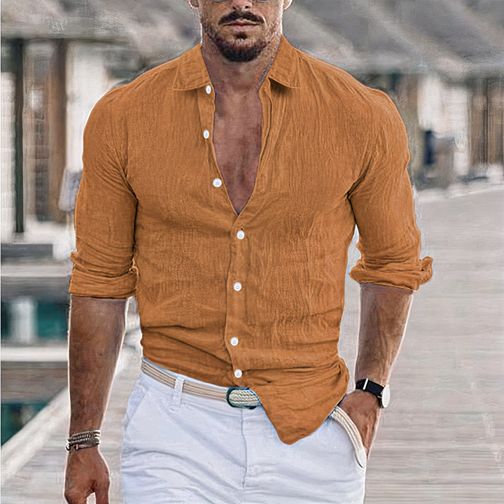 Classic long sleeves beach shirt for men with lightweight, breathable fabric, perfect for summer days and beach outings.






