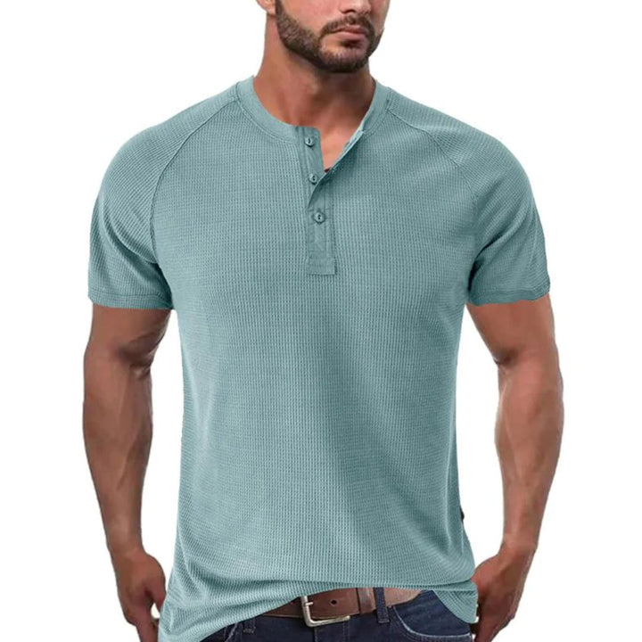 Classic men's summer t-shirt made from soft, breathable fabric for comfortable wear during warm days.