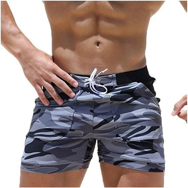 Men's classic swimming boardshorts with quick-drying fabric, adjustable waistband, and breathable design, ideal for beach and pool days.