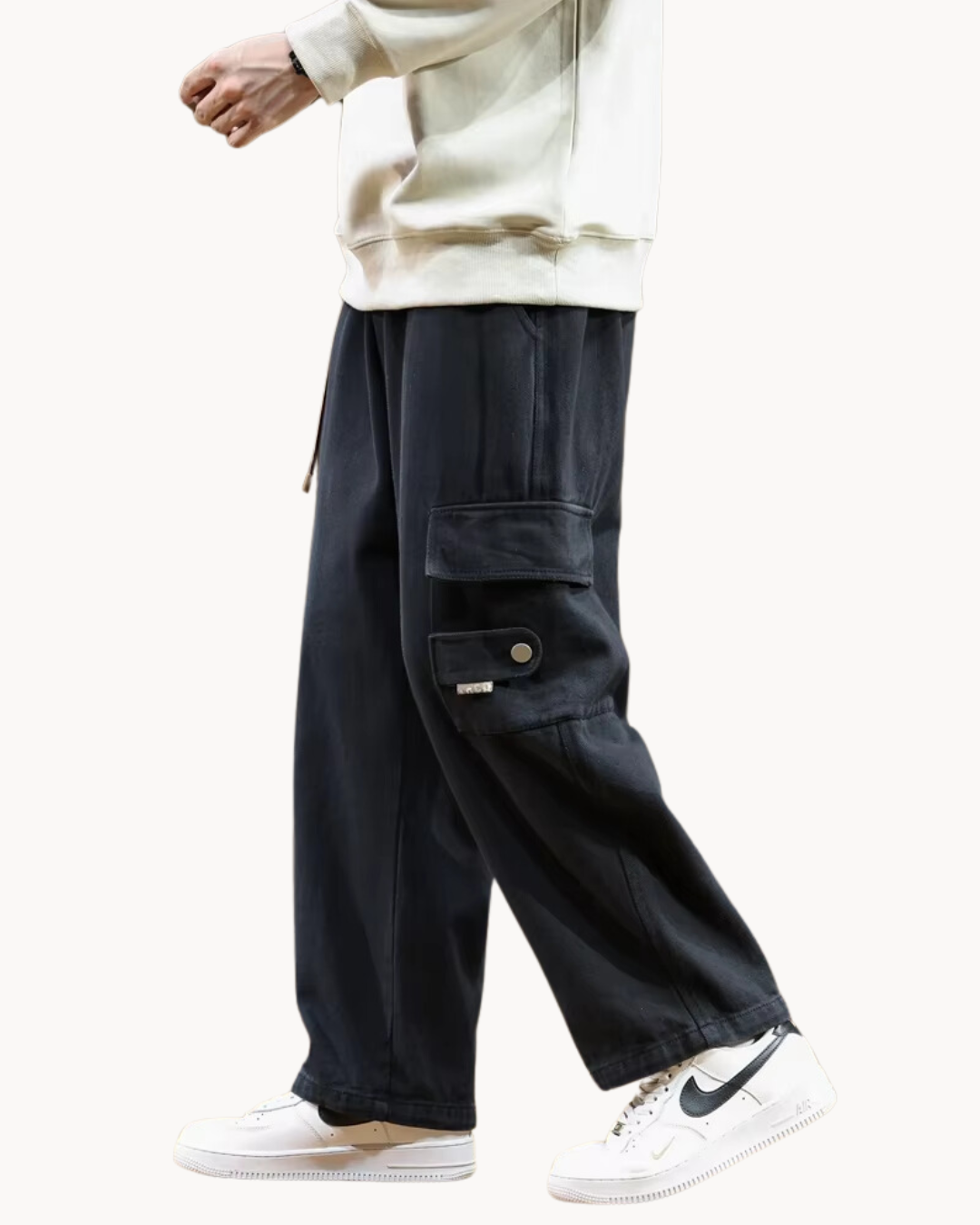 Comfortable baggy cargo-jogger pants with a loose fit, breathable fabric, and functional pockets, perfect for staying stylish and relaxed on summer days.






