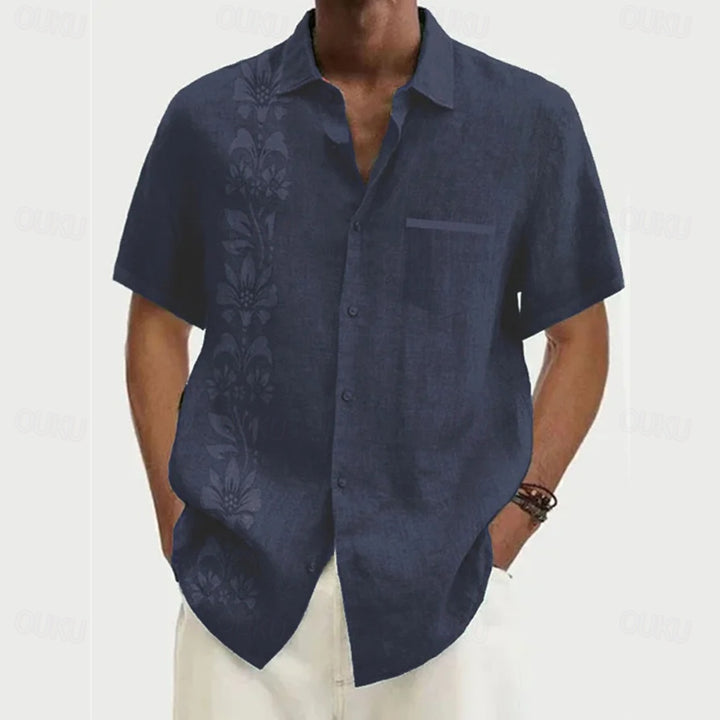 Stylish floral Hawaiian shirt with long sleeves, perfect for summer comfort.







