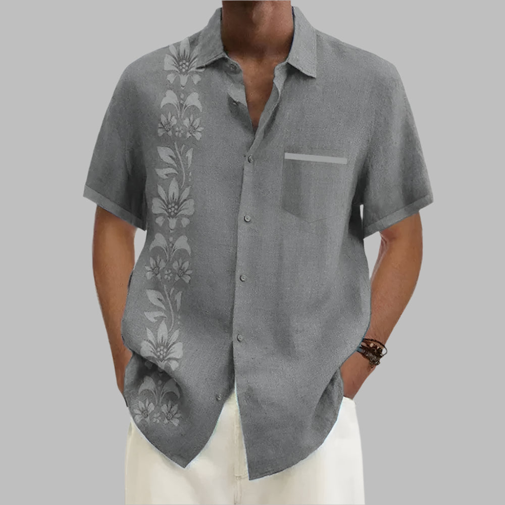 Stylish floral Hawaiian shirt with long sleeves, perfect for summer comfort.







