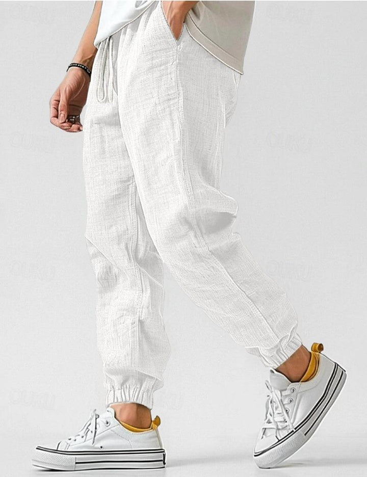 Comfortable linen summer pants for men, designed for a relaxed fit and breathability on warm days.