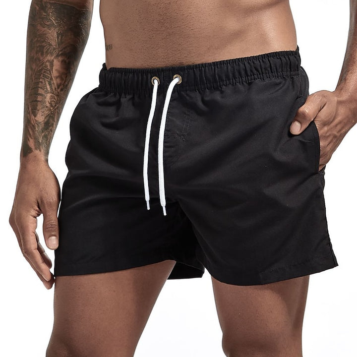 Cool drawstring beach shorts with lightweight fabric and adjustable waistband, perfect for summer days and seaside adventures.






