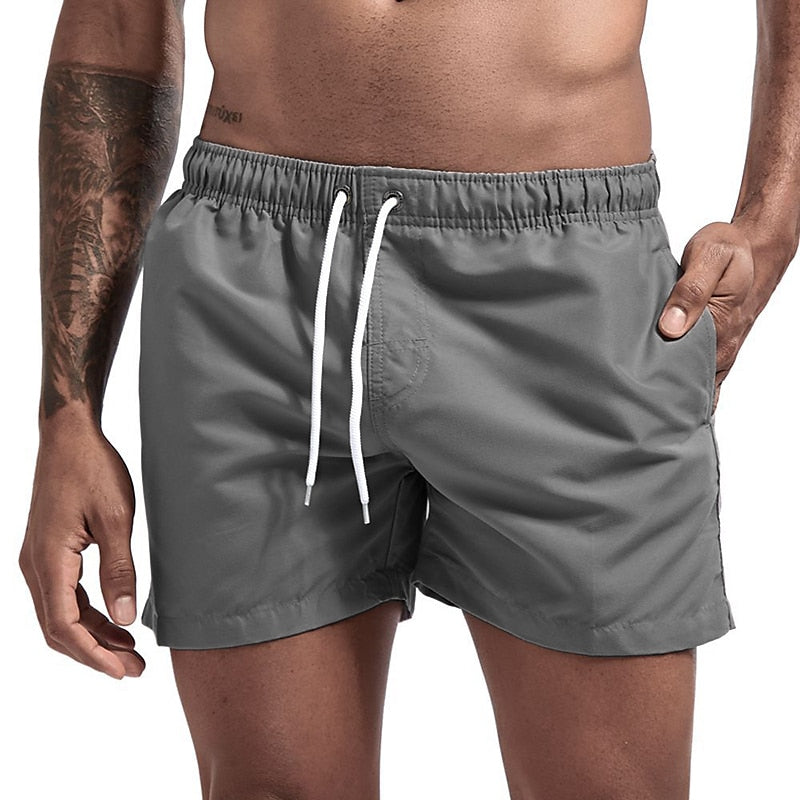 Cool drawstring beach shorts with lightweight fabric and adjustable waistband, perfect for summer days and seaside adventures.






