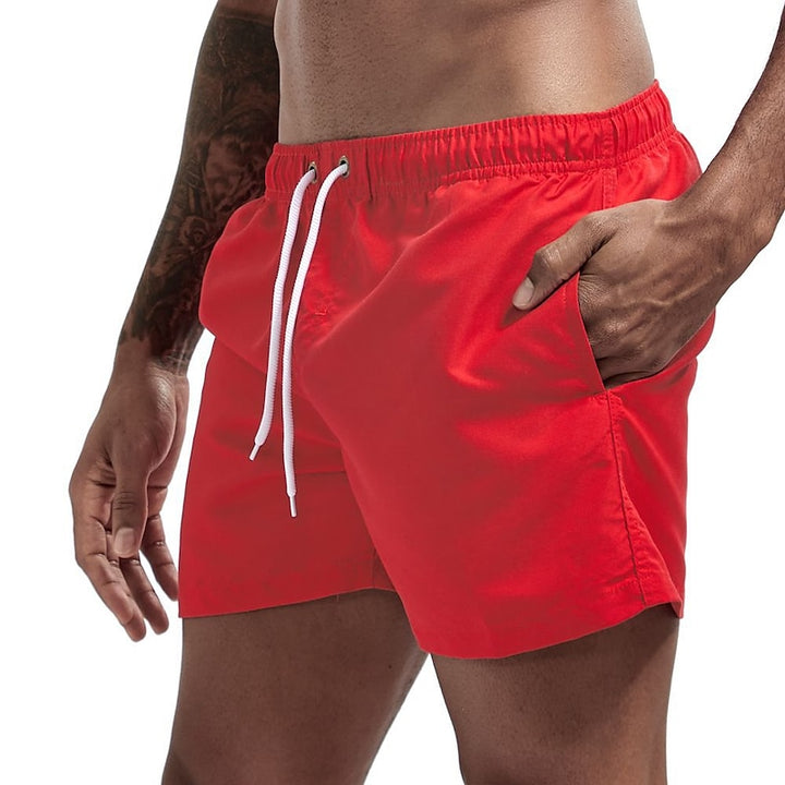 Cool drawstring beach shorts with lightweight fabric and adjustable waistband, perfect for summer days and seaside adventures.






