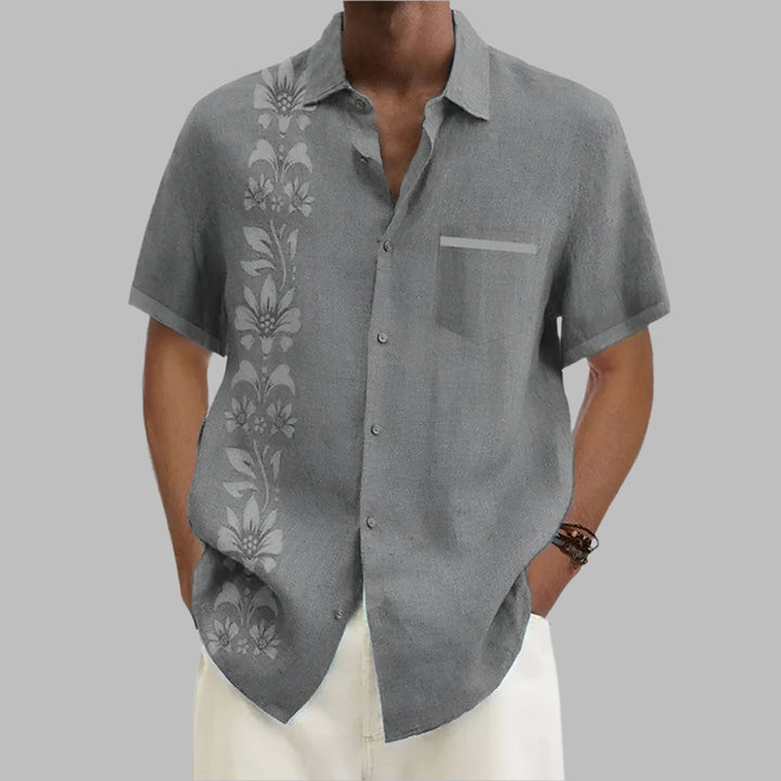  Stylish Hawaiian shirt for men, perfect for summer days, offering comfort and sophistication.






