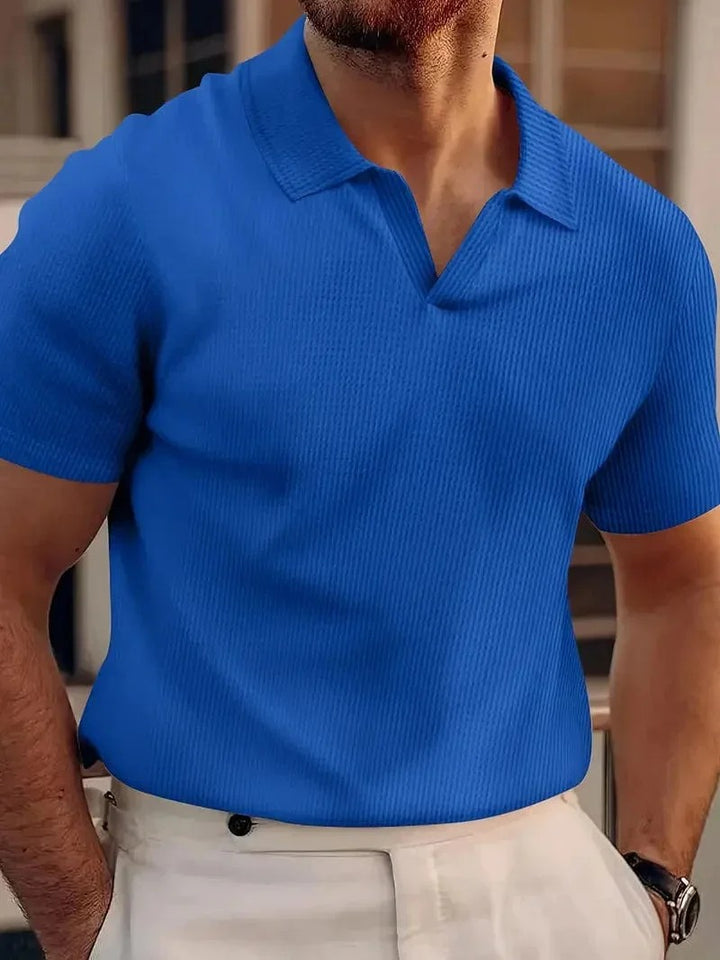 Elegant linen polo shirt for men, featuring breathable fabric, timeless design, and ideal comfort for summer days.