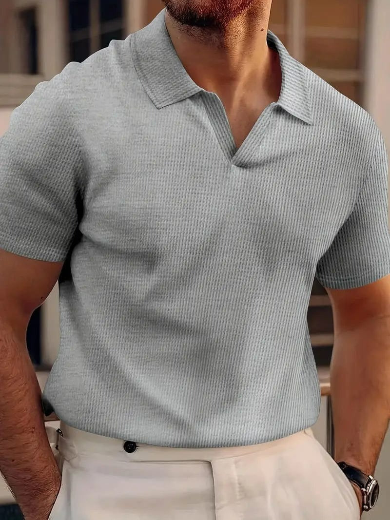 Elegant linen polo shirt for men, featuring breathable fabric, timeless design, and ideal comfort for summer days.