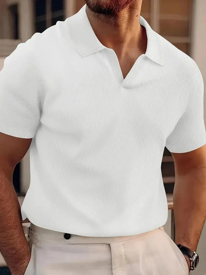 Elegant linen polo shirt for men, featuring breathable fabric, timeless design, and ideal comfort for summer days.