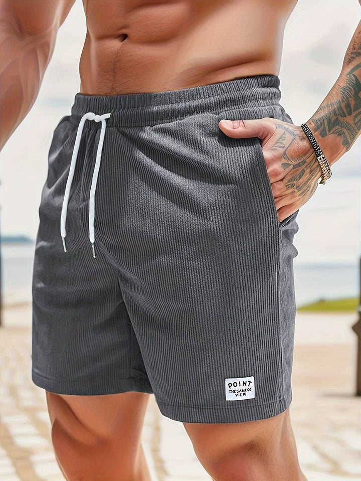 Elegant men's active beach shorts, lightweight and breathable, ideal for summer adventures and casual outings.






