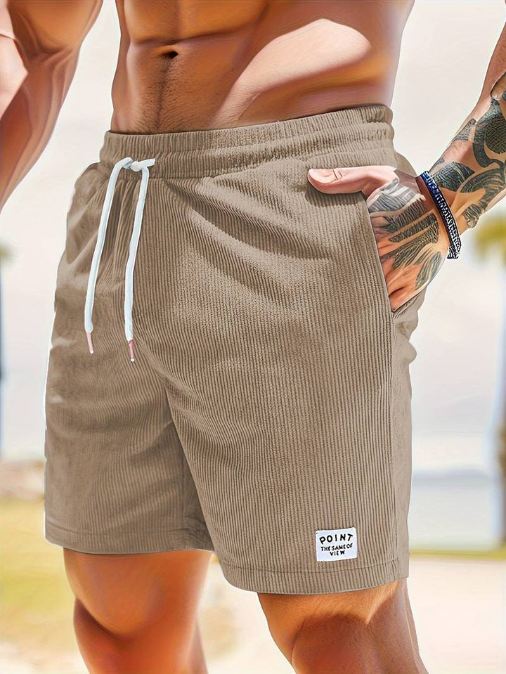 Elegant men's active beach shorts, lightweight and breathable, ideal for summer adventures and casual outings.






