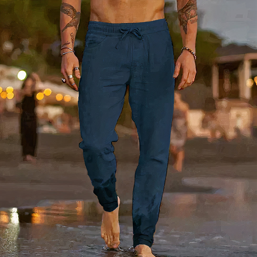 Linen trousers designed for summer with breathable fabric, relaxed fit, timeless style, and moisture-wicking properties, perfect for staying cool and stylish on warm days.