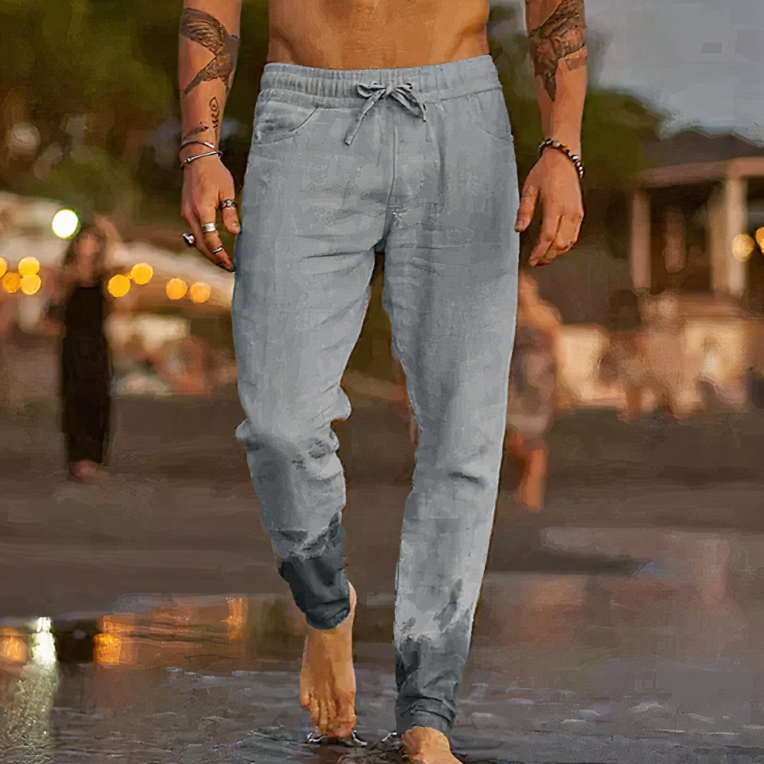 Linen trousers designed for summer with breathable fabric, relaxed fit, timeless style, and moisture-wicking properties, perfect for staying cool and stylish on warm days.