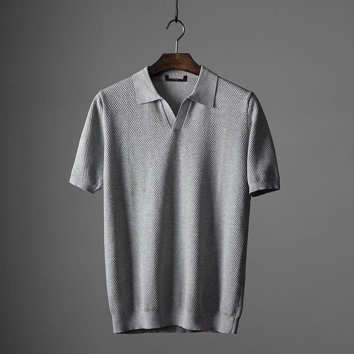 Luxe knitted polo shirt for men with lightweight, breathable fabric, offering style and comfort for summer days.