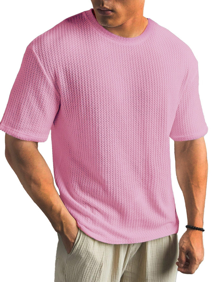  Men’s casual basic tee with breathable fabric and timeless design, ideal for summer days and versatile wear.