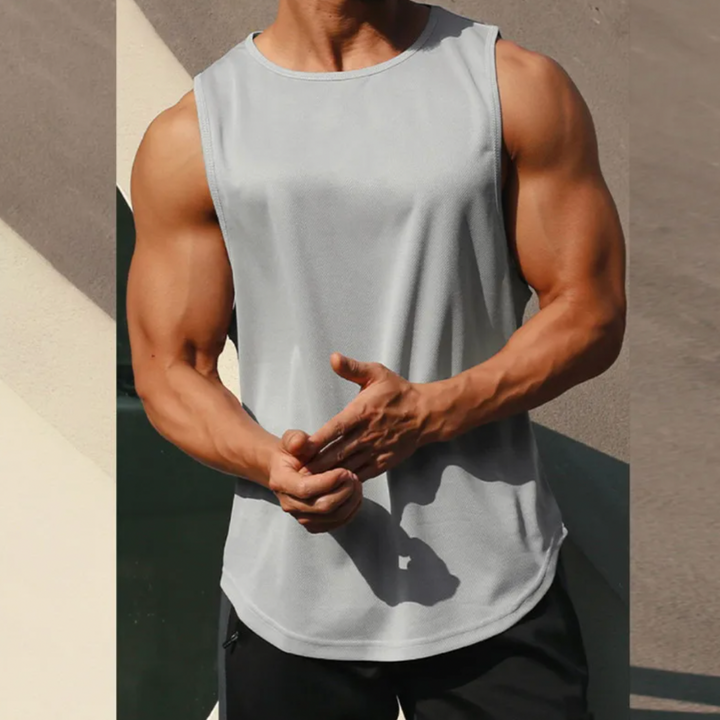 Men's casual gym tank top with breathable fabric and moisture-wicking technology, ideal for summer days and workouts.






