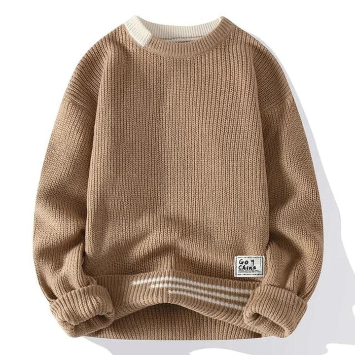  Men's casual ribbed knit sweater with a cozy texture, perfect for layering on autumn days.