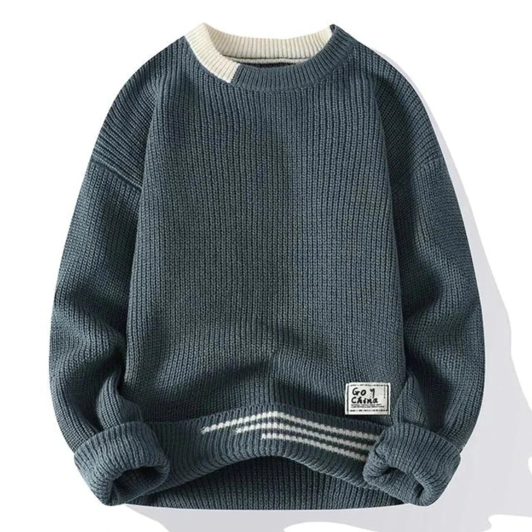  Men's casual ribbed knit sweater with a cozy texture, perfect for layering on autumn days.