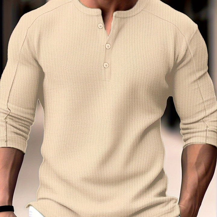 Men's casual waffle knit long sleeve shirt with breathable fabric, soft material, and a versatile design for stylish comfort.