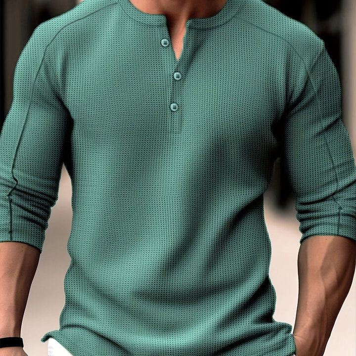 Men's casual waffle knit long sleeve shirt with breathable fabric, soft material, and a versatile design for stylish comfort.