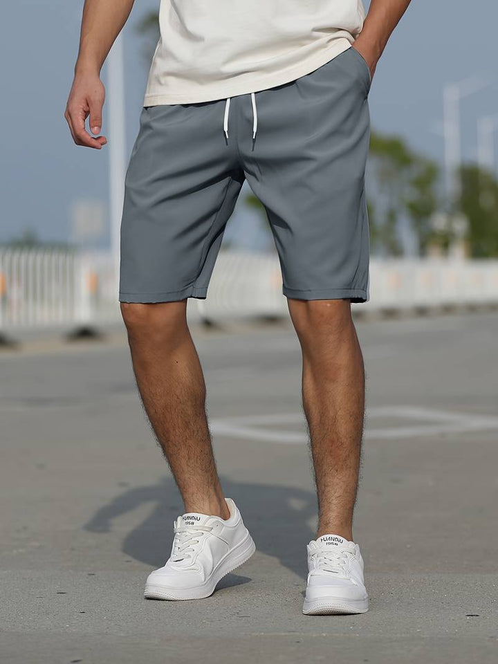 Men's basic drawstring summer shorts, lightweight and breathable for casual summer comfort and versatile wear.






