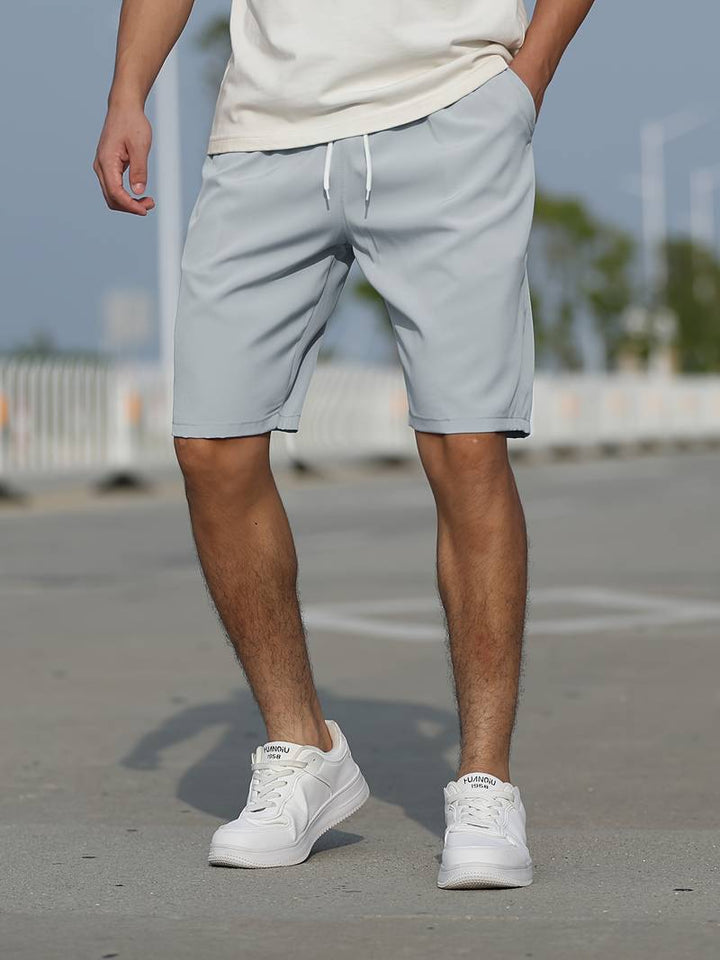 Men's basic drawstring summer shorts, lightweight and breathable for casual summer comfort and versatile wear.






