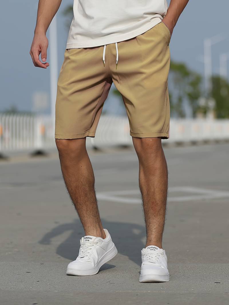 Men's basic drawstring summer shorts, lightweight and breathable for casual summer comfort and versatile wear.






