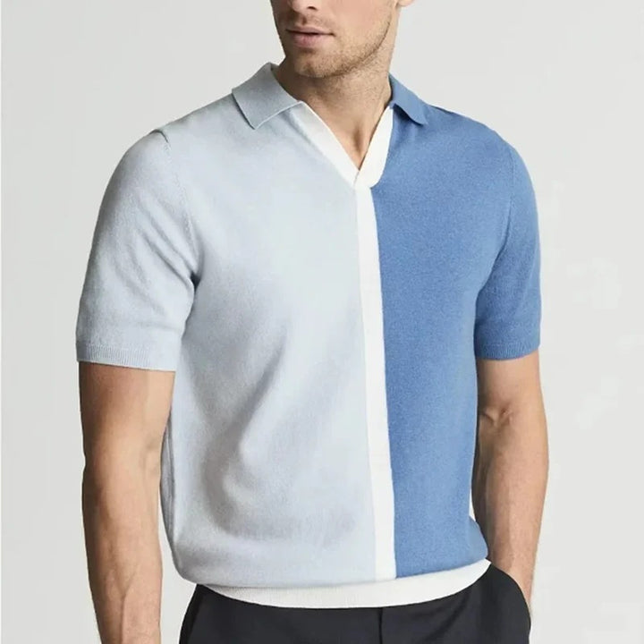 Men's elegant dual-tone polo shirt with breathable fabric and modern design, perfect for summer days and versatile wear.






