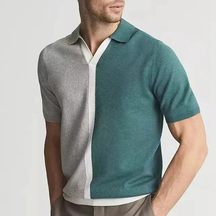 Men's elegant dual-tone polo shirt with breathable fabric and modern design, perfect for summer days and versatile wear.






