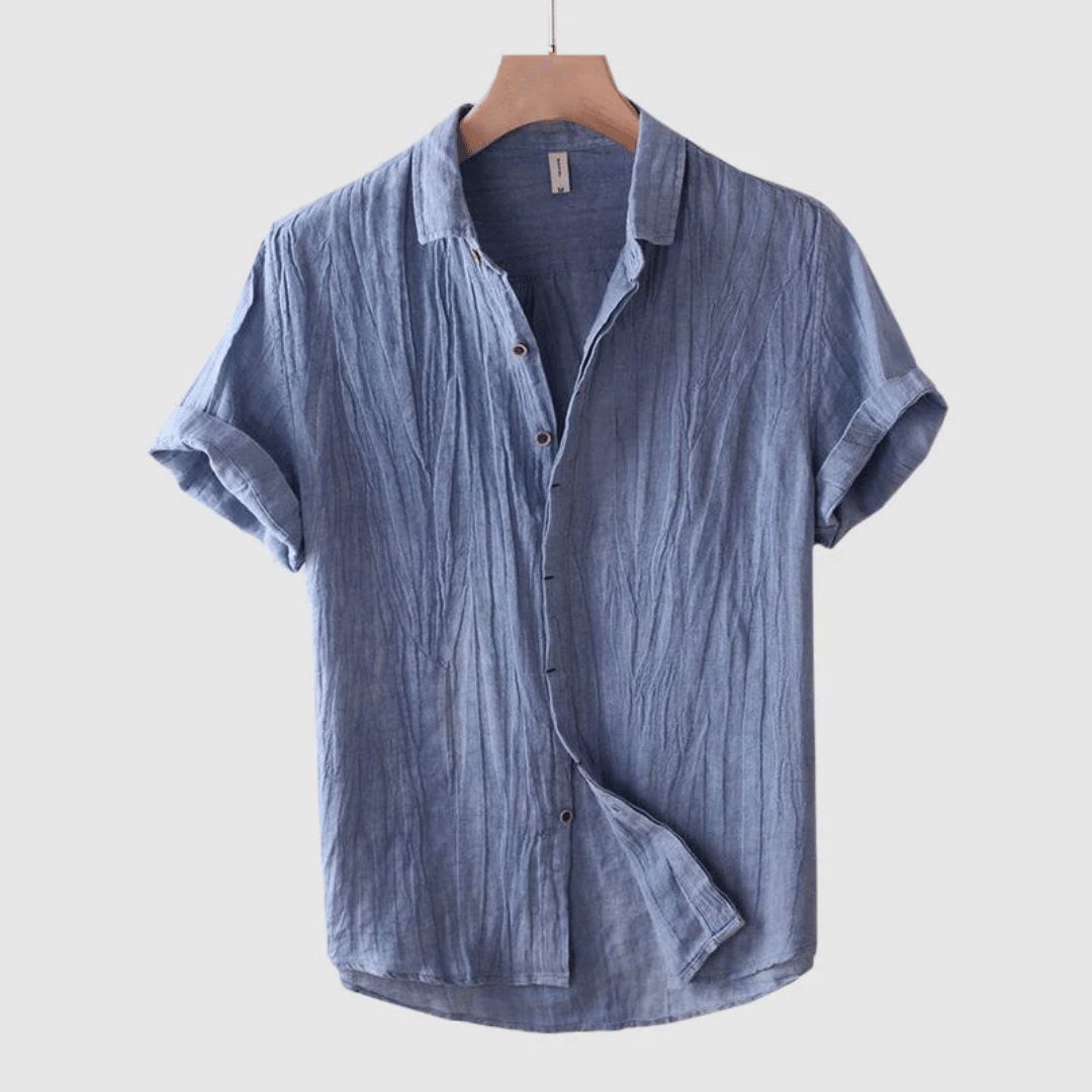 Men’s lightweight casual shirt, perfect for summer days with breathable fabric and a relaxed, versatile design.






