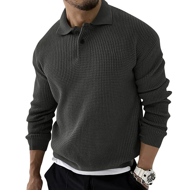 Men's stylish knitted autumn sweater with breathable fabric, perfect for cool autumn days.







